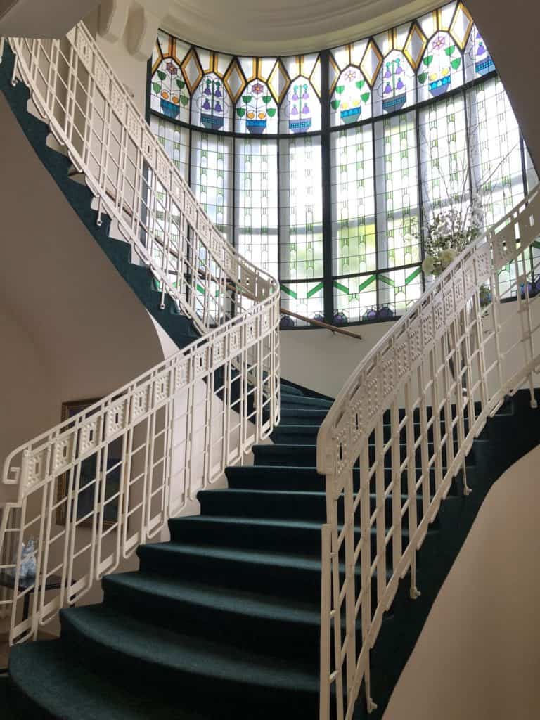 The stunning stained glass decorating the staircase in the Art Deco European Spa Irma and Hotel Thermia.