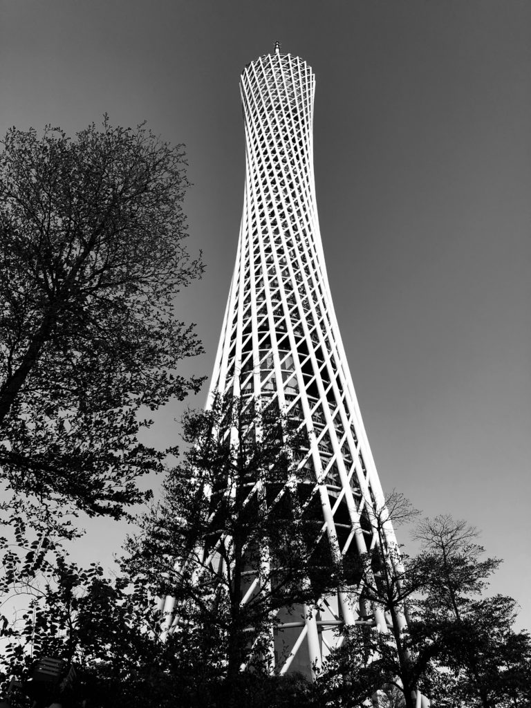 Standing at the base of the tower and looking way up to the top.