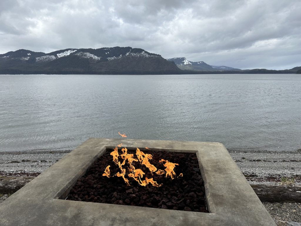 Stout on the patio behind the Duck Point Smokehouse and enjoy a warm fire and spectacular views.