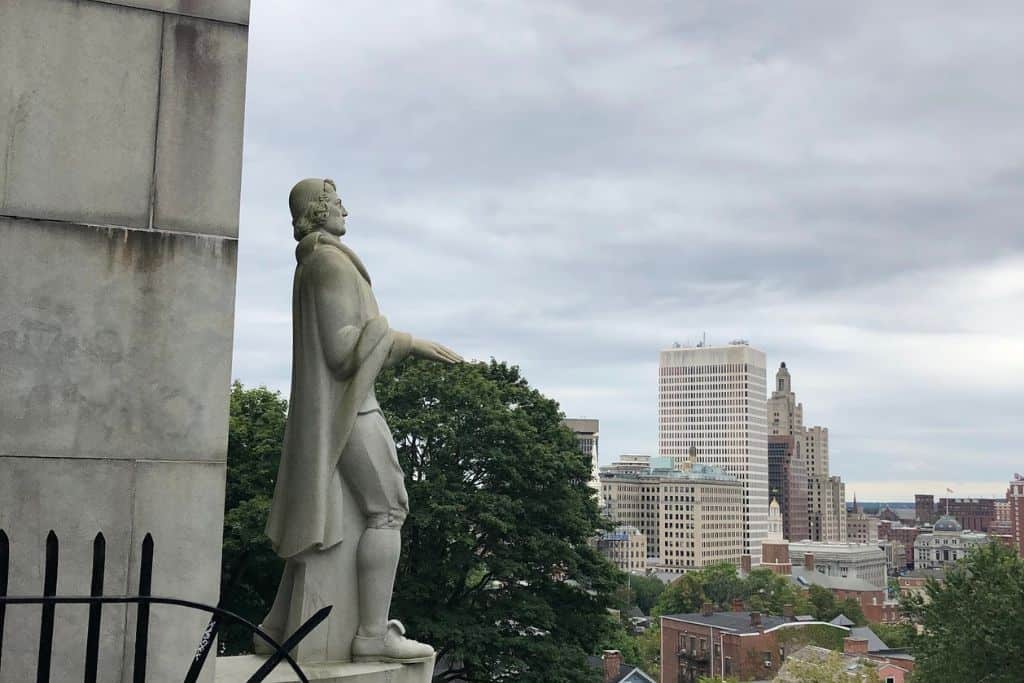 Roger Williams, the founder of the state, overlooking the city of Providence and letting you know Rhode Island is worth visiting this year.