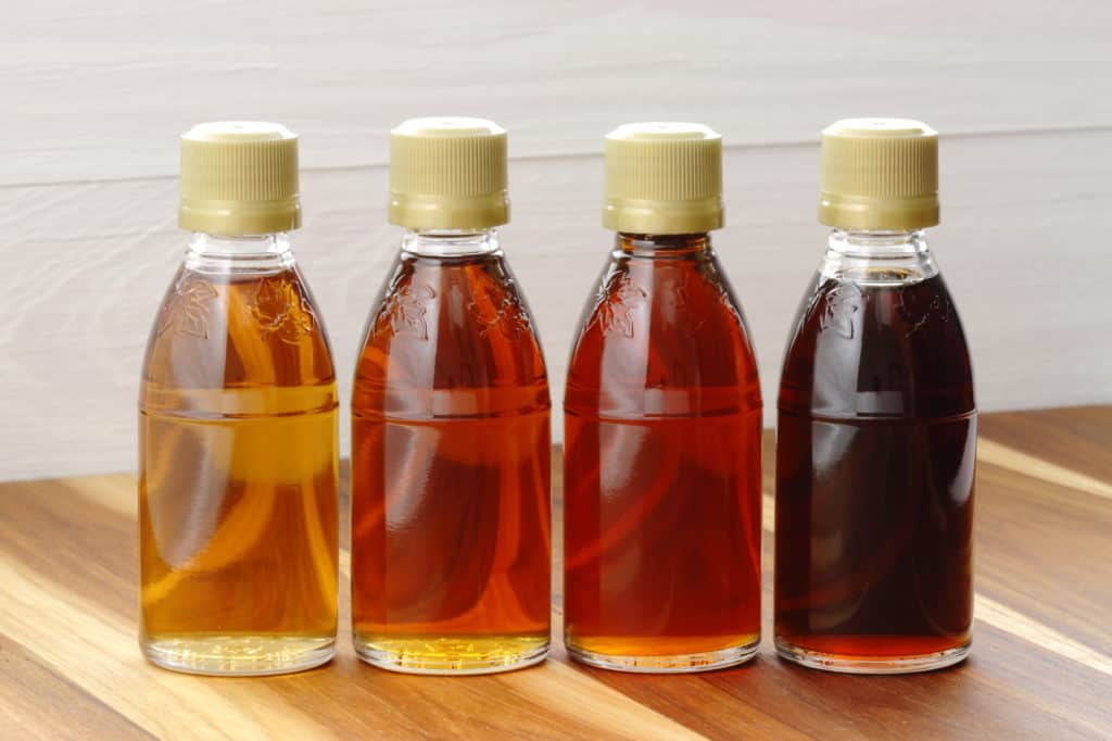 Delicious maple syrup in different grades to be used for all kinds of treats.