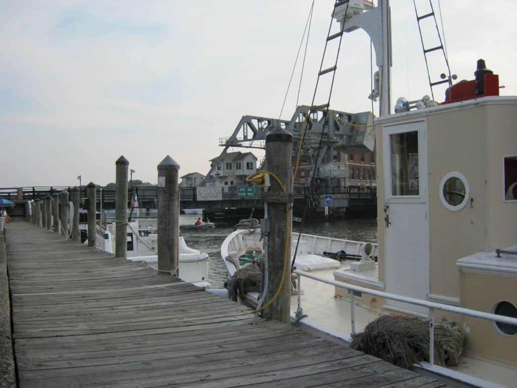 Watch the drawbridge rise right in the middle of the shopping street as boats pass under the bridge in Mystic, CT.