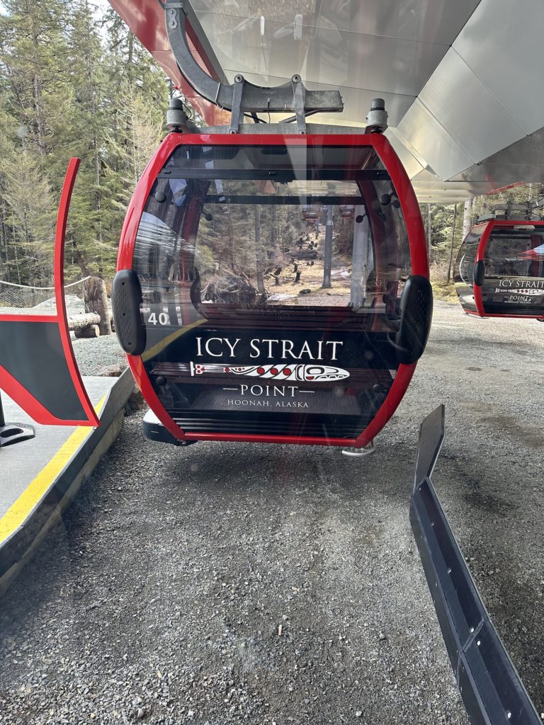 Riding the red gondola to the top of the mountain is one of the most picturesque things to do in Icy Strait Point.