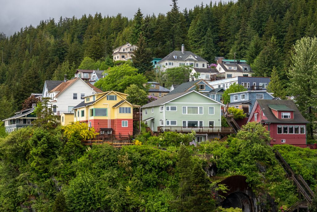 Look for Married Men's Trail running up the hill behind the houses when you visit Creek Street in Ketchikan.