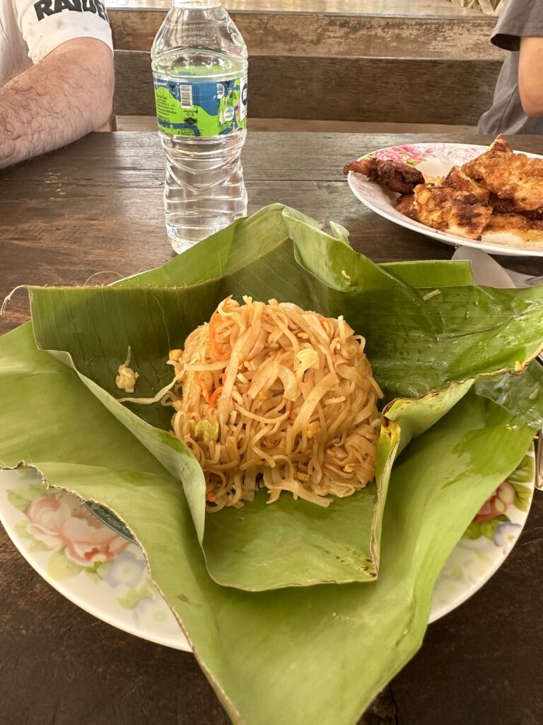 Our pad Thai wrapped in banana leaves after our visit to Smile Elephant Sanctuary.