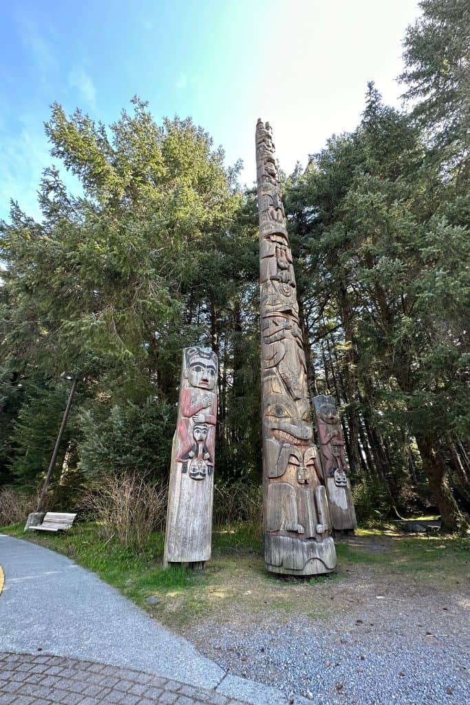 One of the things to do in Sitka Alaska in just one day is to visit Totem Park and hear about the history of them.