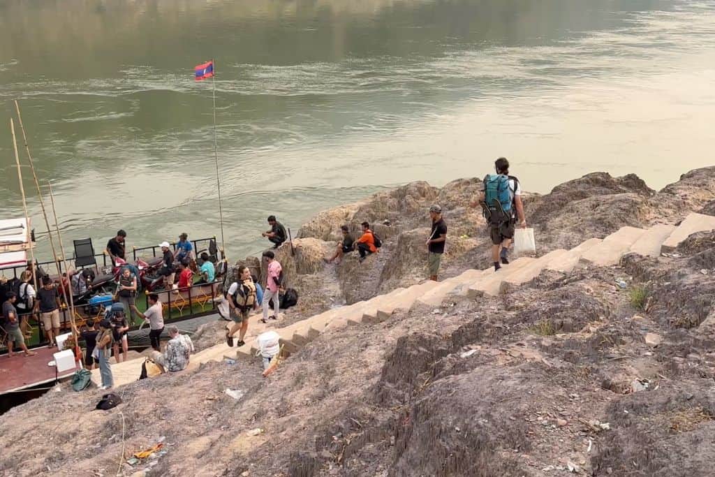 The steep uneven cement steps down to the boat. There is no handle to assist getting down.