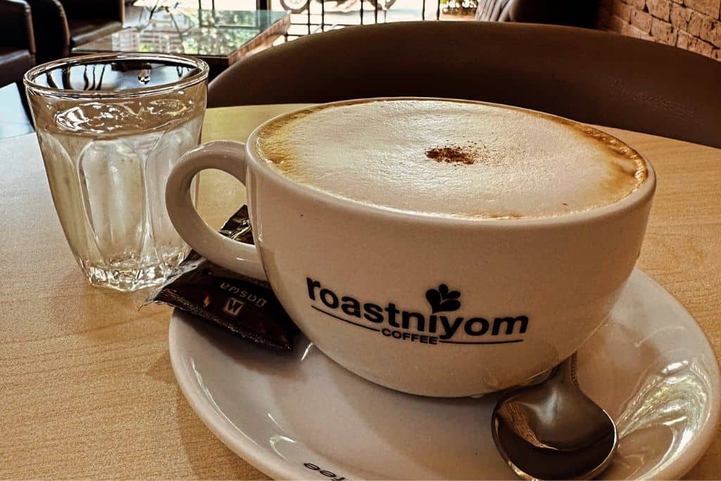 A cup of cappuccino at Roastniyom, down the street from the Old City Wall Inn