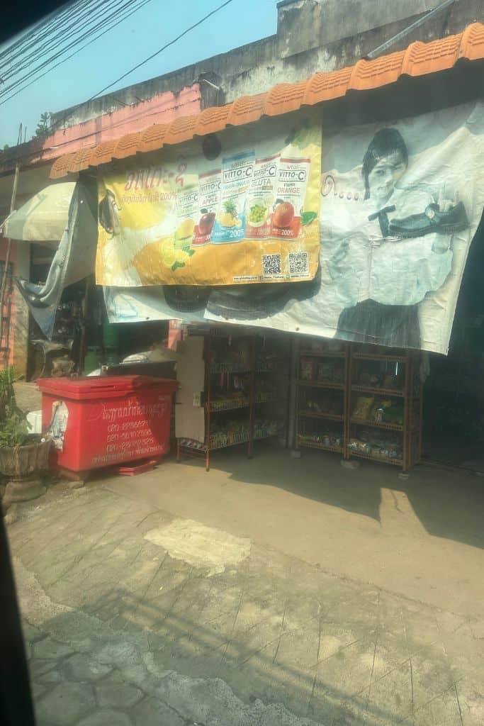 A small dark and sketchy shop where we bought snacks for the slow boat ride.