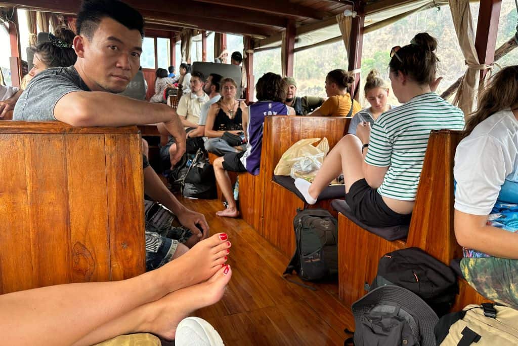 The wooden benches on the Mekong River slow boat.