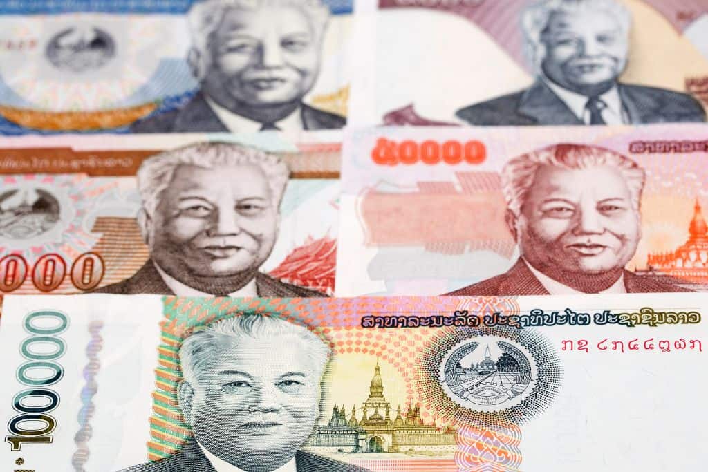 Several different denominations of Laotian kip bills.