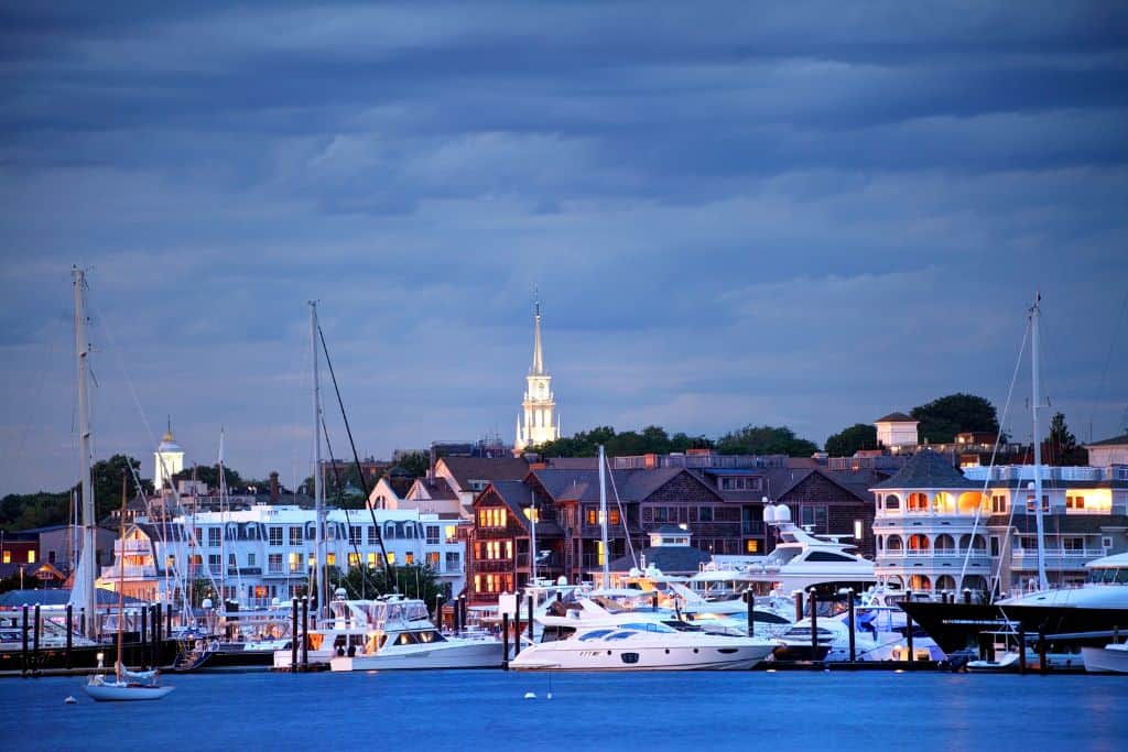 Newport Harbor with ships in the harbor and the city in the background