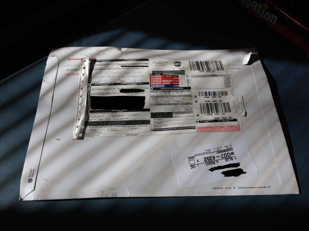 A well-worn package containing the travel documents to get a visa to China.